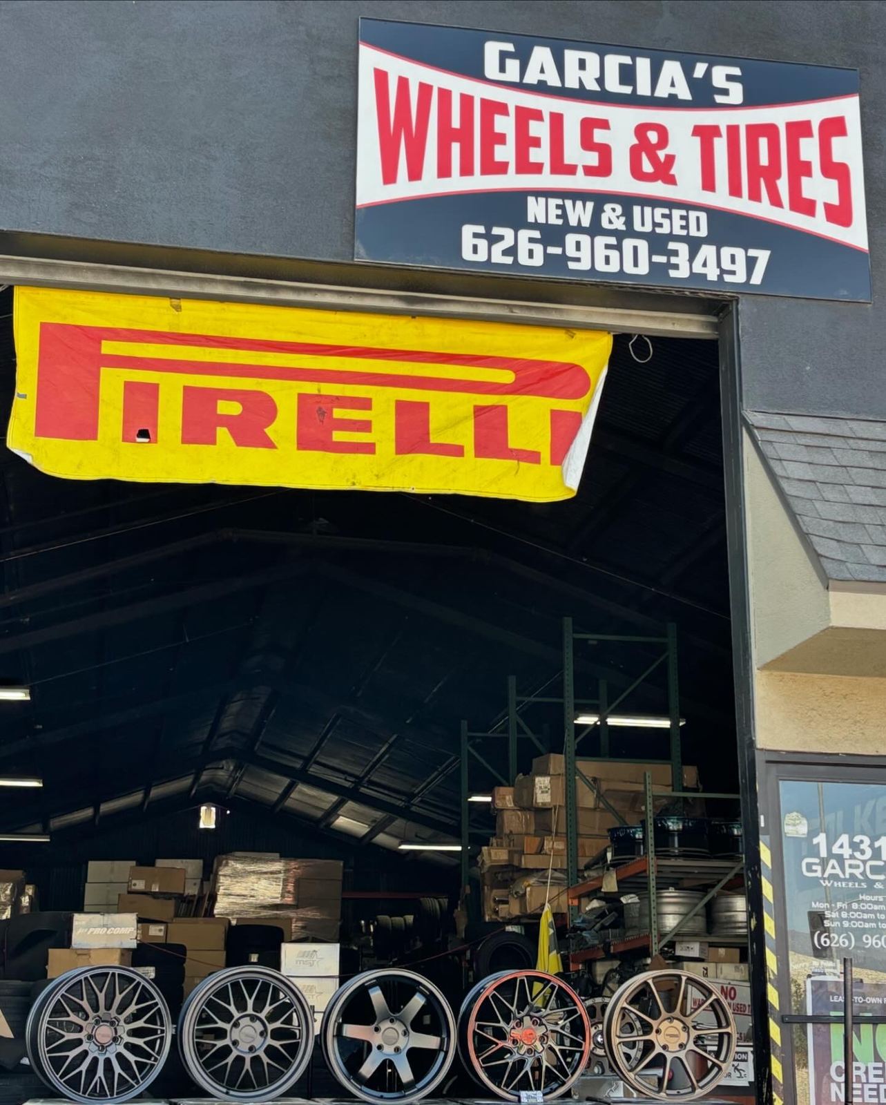 Garcia's Wheels & Tires storefront in Baldwin Park with the shop sign and Pirelli banner